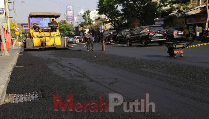 penyiraman-dampak-proyek-pengaspalan