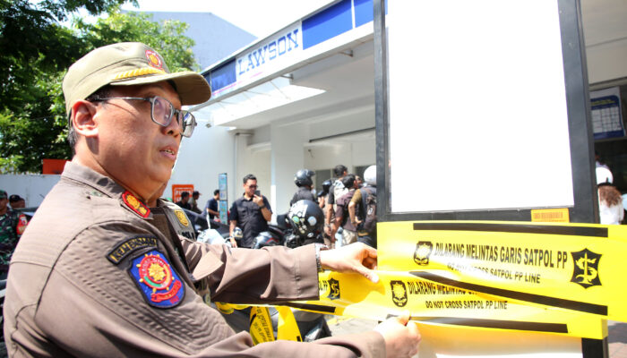 tak-ada-jukir-resmi-lahan-parkir-minimarket